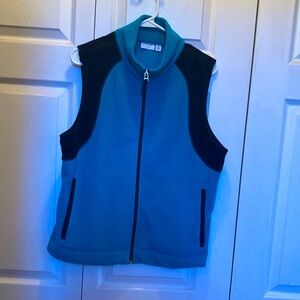Kim Roger’s vest. Teal and black  size XL